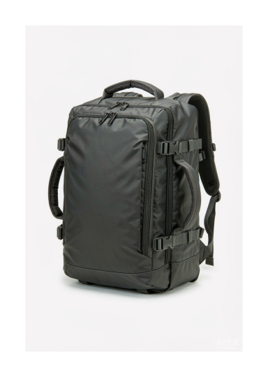 A travel duffel backpack with a hybrid duffel and backpack design, side grab handles, convertible shoulder straps and waterproof fabric, shown on a clean white background. A travel duffel backpack with a hybrid duffel and backpack design, side grab handles, convertible shoulder straps and waterproof fabric, shown on a clean white background.