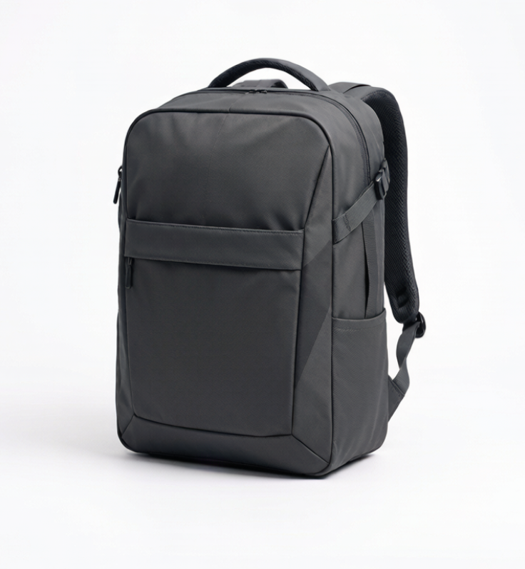 Charcoal grey travel backpack for Europe, cabin-size carry-on design with clamshell opening, compression straps and front document pocket, shown on a clean white background with generous margins
